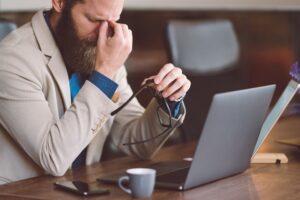 man stressed at work